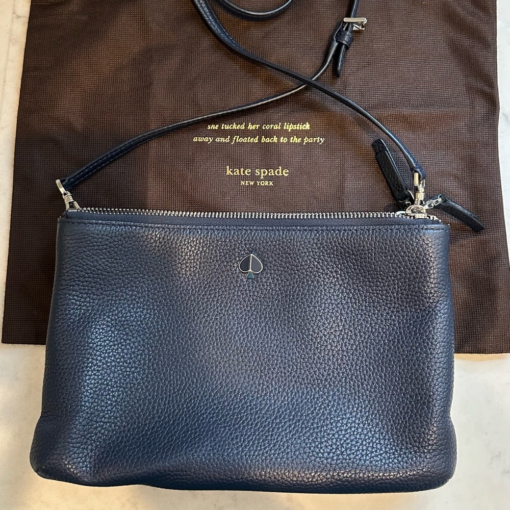 Navy blue Kate spade crossbody two zipper pouches and one middle magnet closure